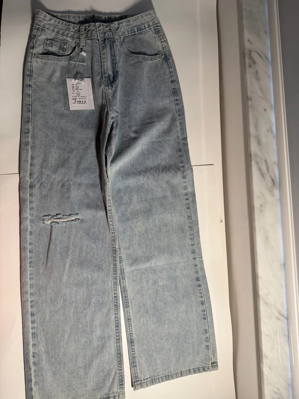 Women’s Light Wash High-Waisted Wide Leg Distressed Jeans
